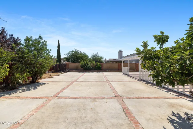 a view of a garden with pathway