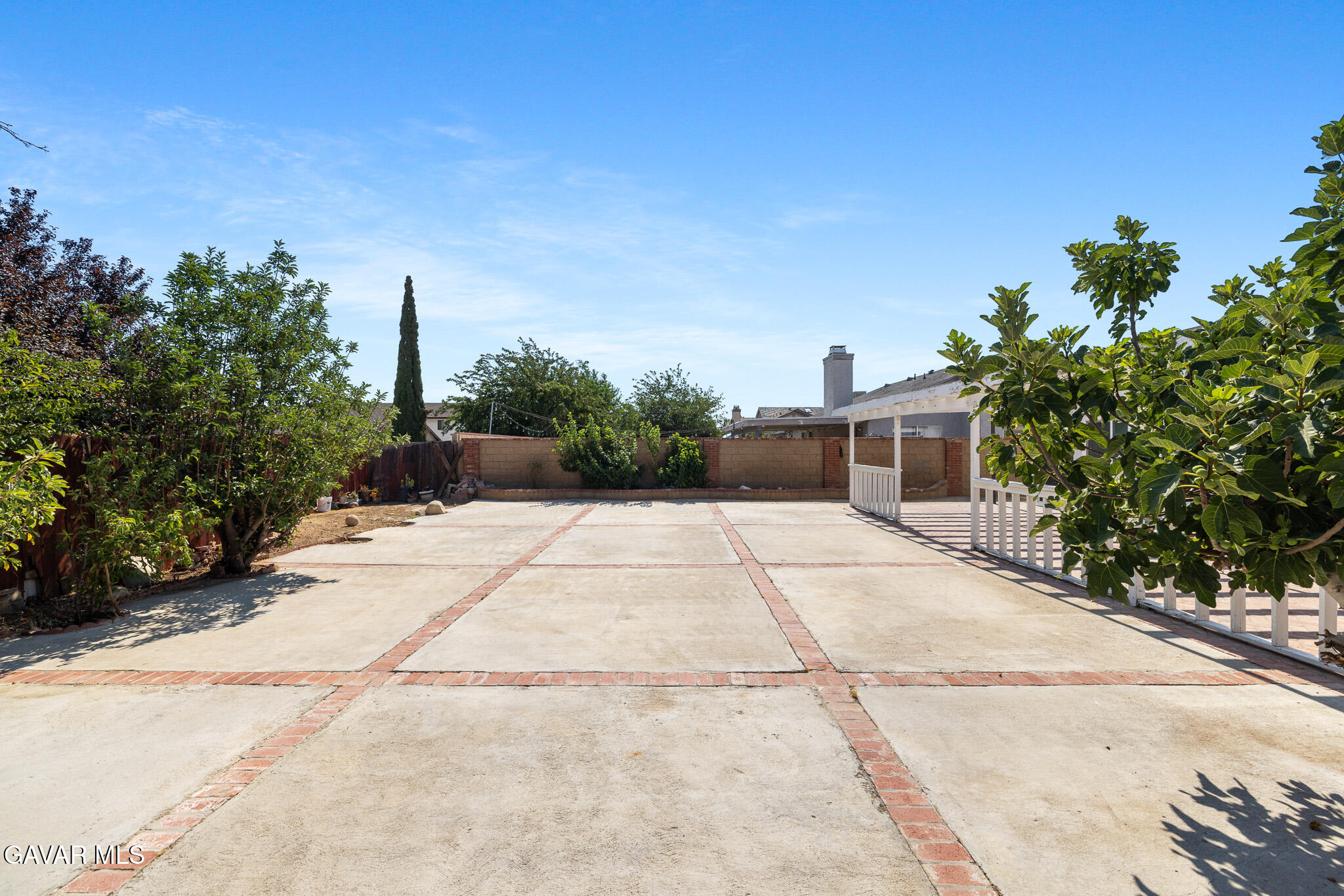 4753 East Ave R 11 Palmdale, CA 93552 - Photo 36 of 41 a view of a garden with pathway