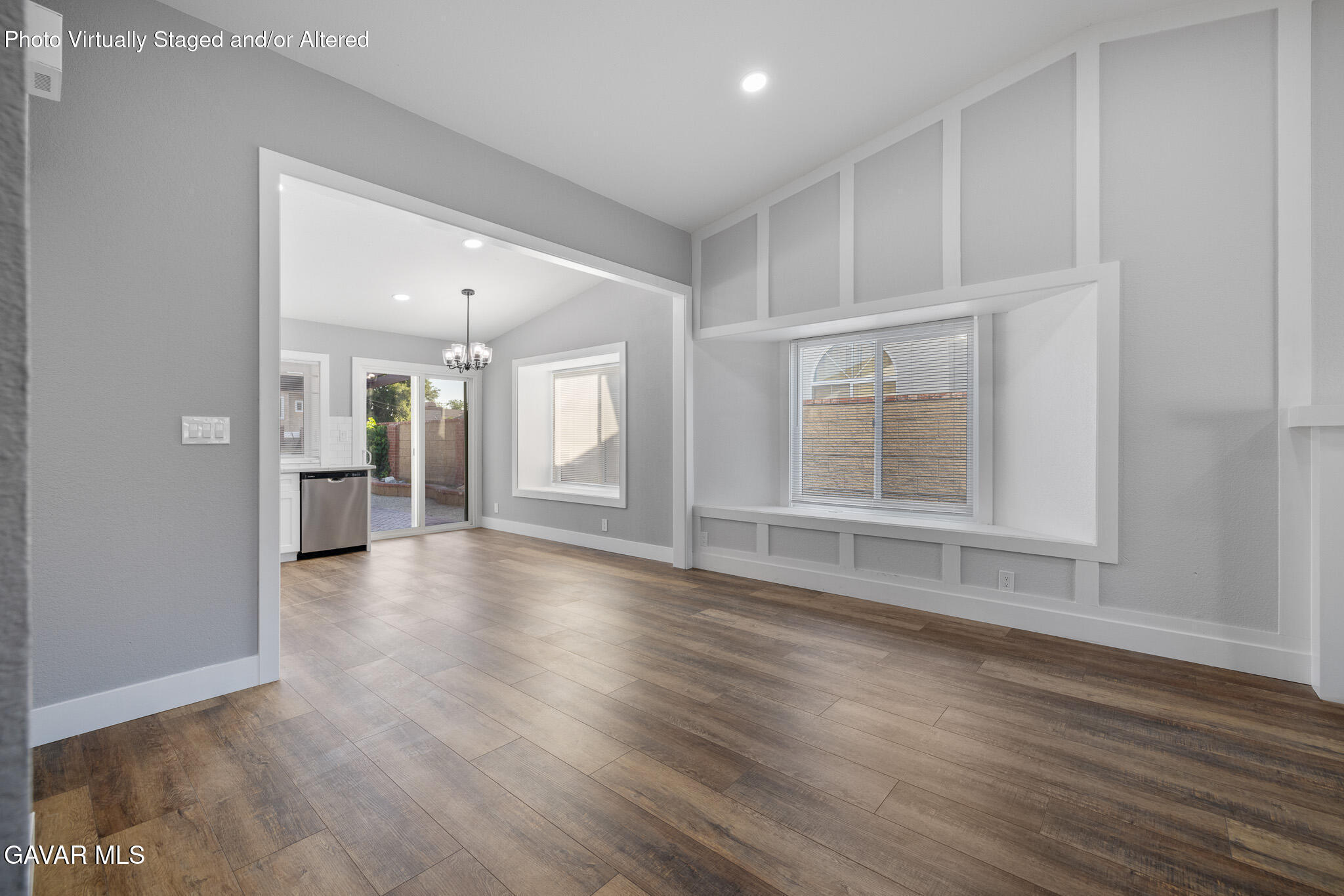 4753 East Ave R 11 Palmdale, CA 93552 - Photo 6 of 41 wooden floor in an empty room with a window