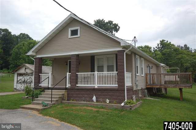 1099 Porters Road Spring Grove, PA 17362 - Photo 1 of 1 a view of front a house with a yard