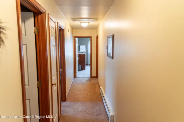 a view of hallway with shower