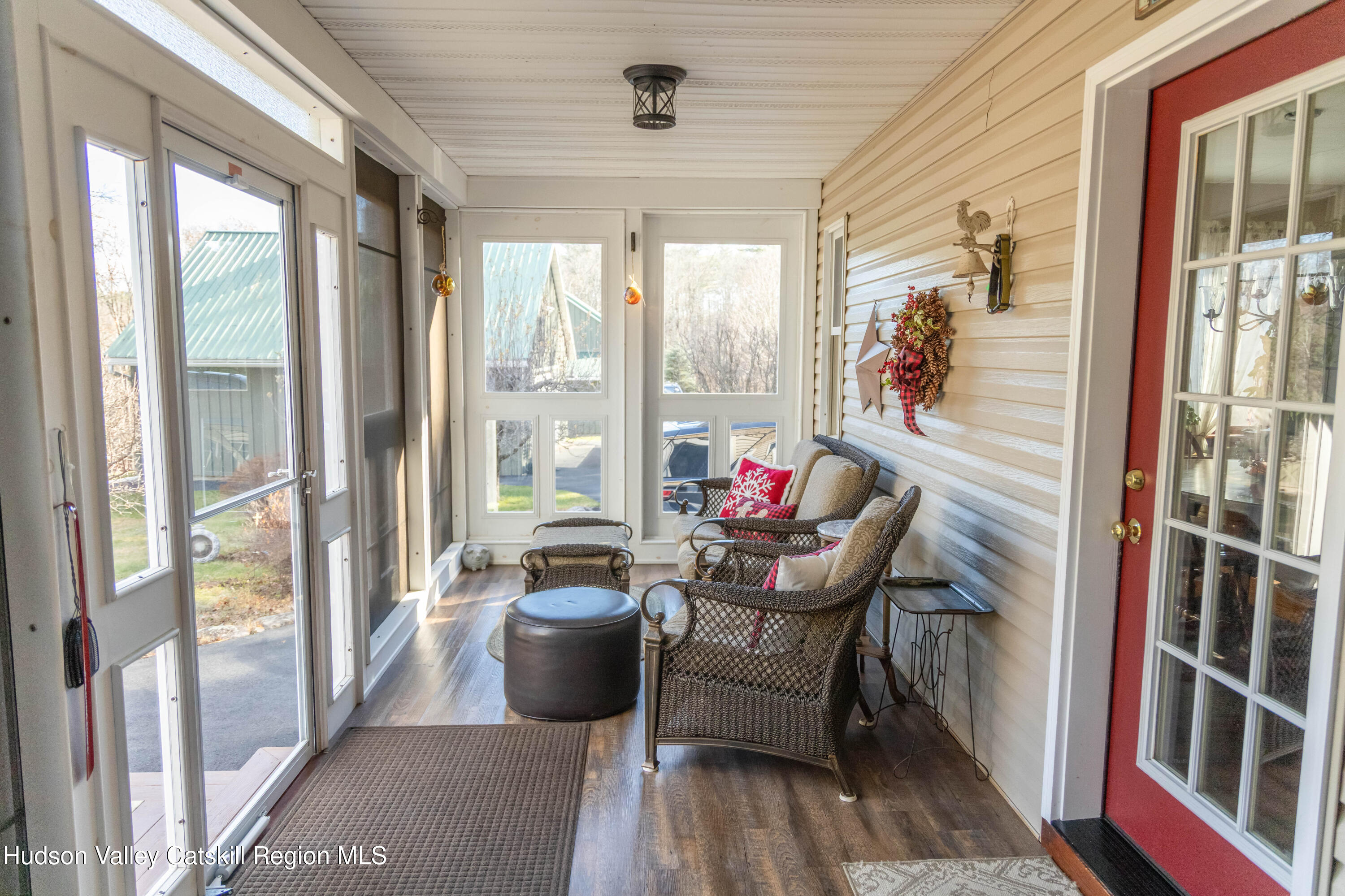 596 Joseph Chadderdon Road Acra, NY 12405 - Photo 2 of 55 a very nice looking room with a large window and dining table