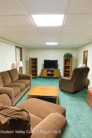 a room with a table and chairs