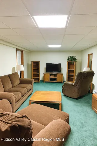 a room with a table and chairs