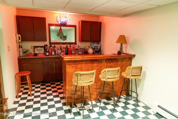 a very nice looking room with a large window and dining table