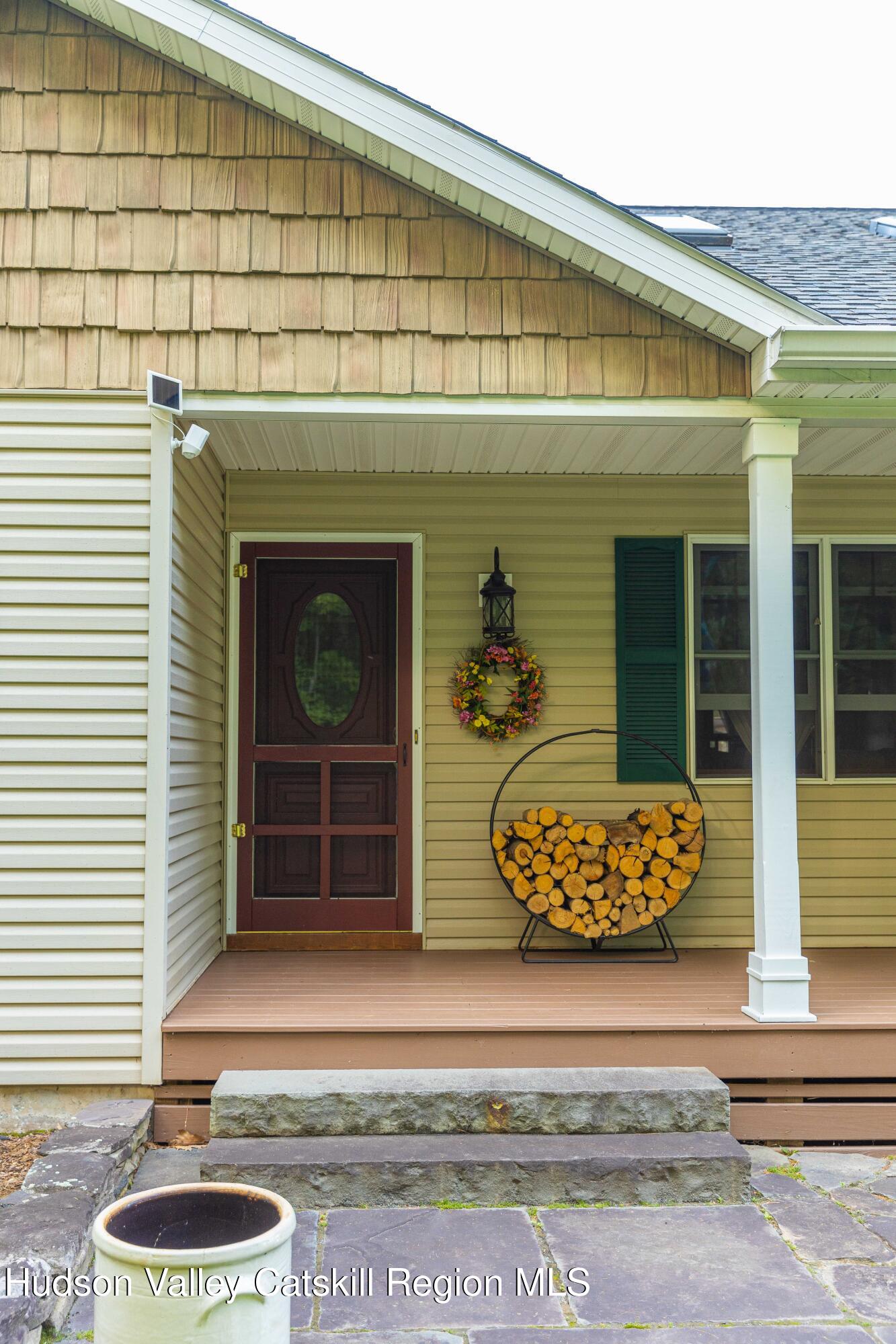 596 Joseph Chadderdon Road Acra, NY 12405 - Photo 49 of 55 a front view of a house with entryway
