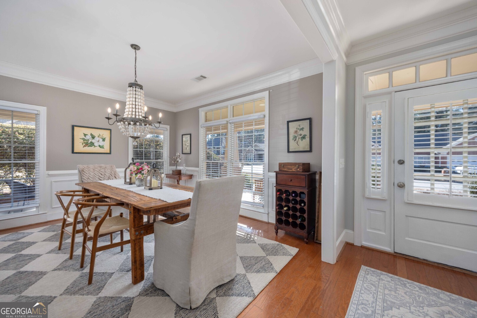 6742 Bridge Way Columbus, GA 31904 - Photo 12 of 45 a view of a dining room with furniture window and wooden floor