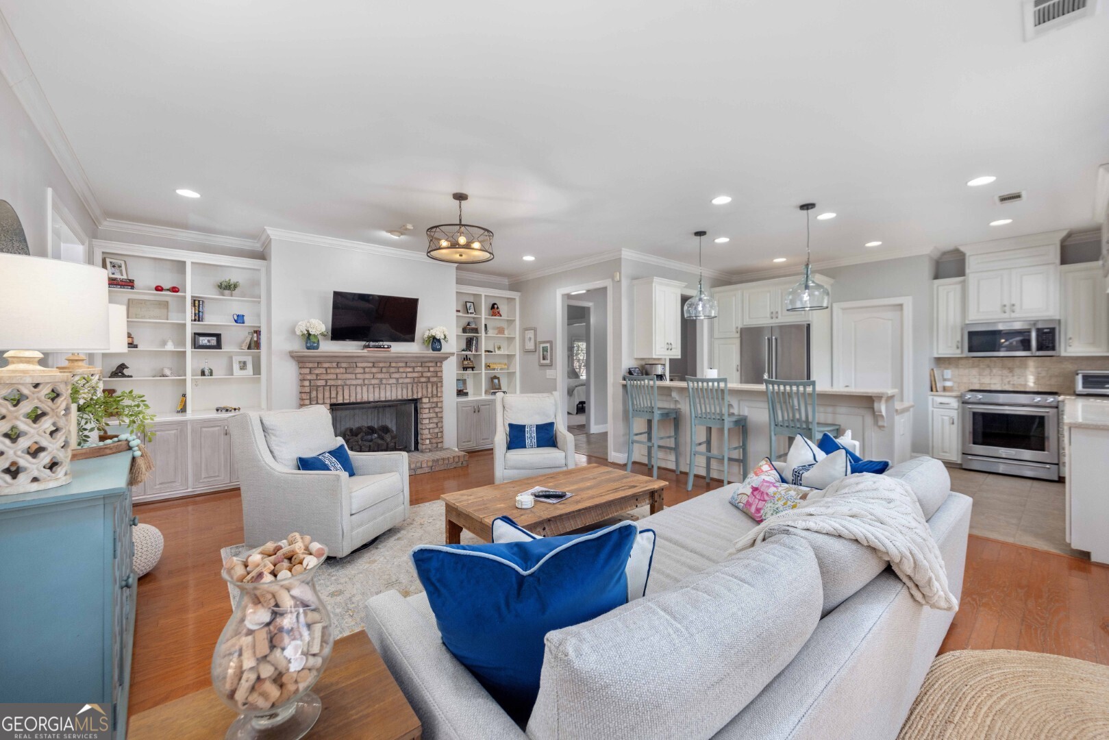 6742 Bridge Way Columbus, GA 31904 - Photo 17 of 45 a living room with furniture and a fireplace