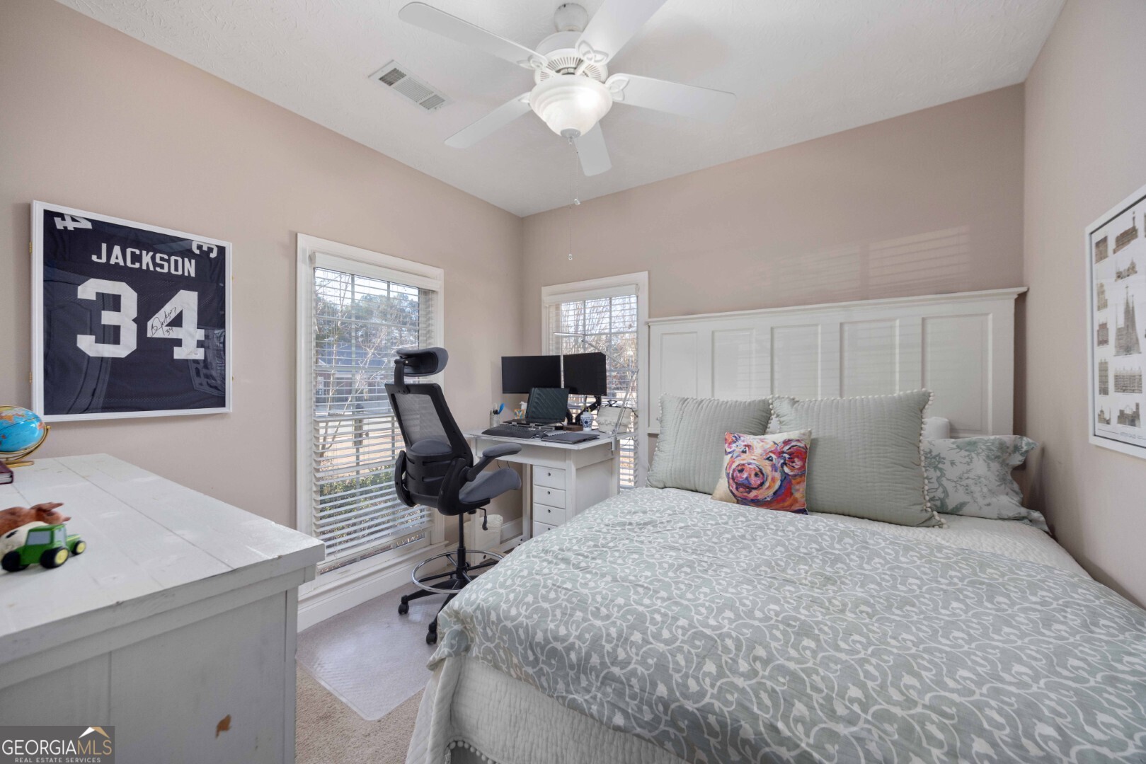 6742 Bridge Way Columbus, GA 31904 - Photo 27 of 45 a bedroom with a bed and a chair