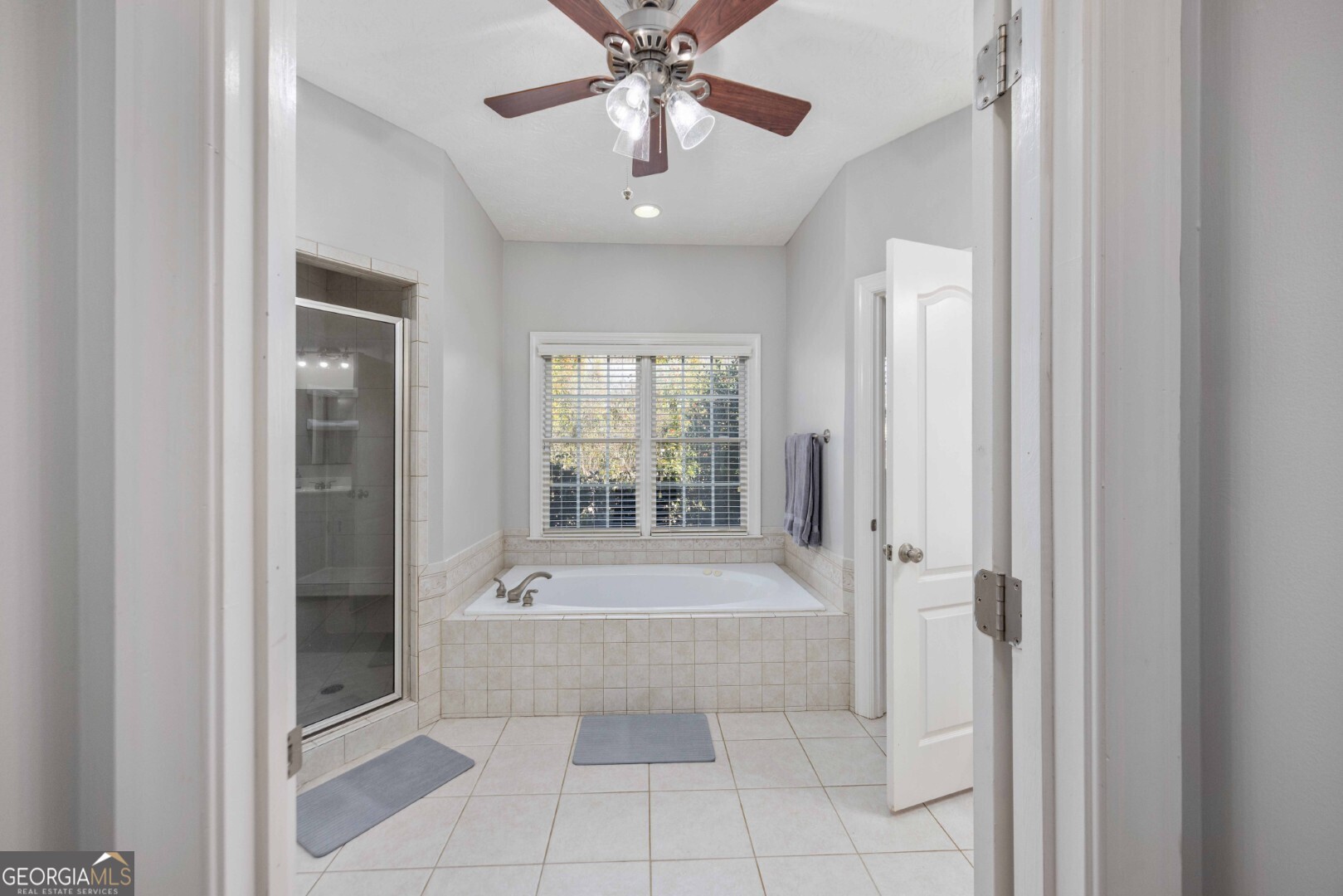 6742 Bridge Way Columbus, GA 31904 - Photo 31 of 45 a bathroom with a bathtub and a shower