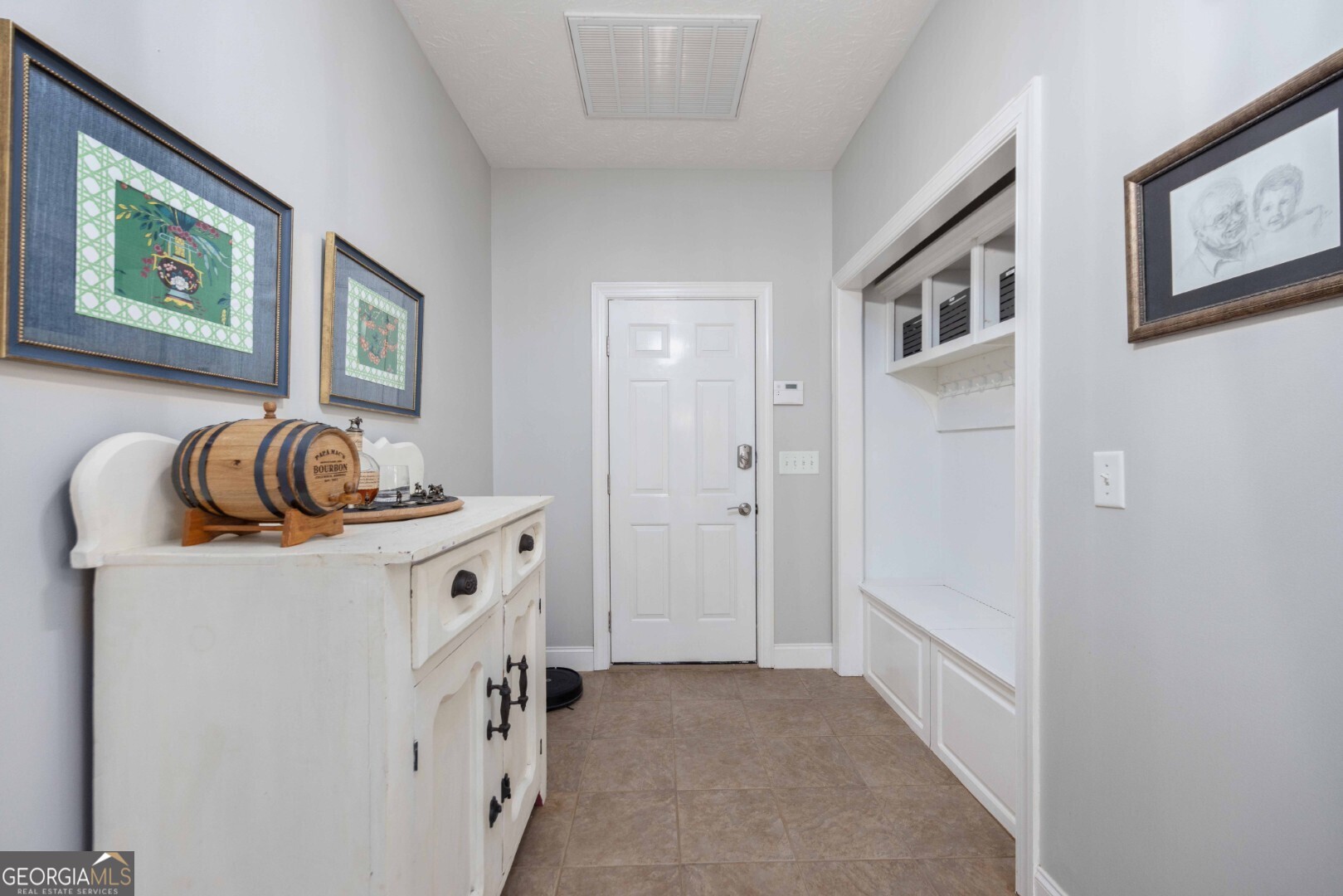 6742 Bridge Way Columbus, GA 31904 - Photo 35 of 45 a spacious bedroom with a bed and a cabinet
