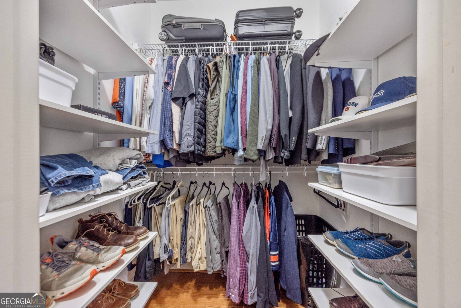 6742 Bridge Way Columbus, GA 31904 - Photo 37 of 45 a view of walk in closet with clothes and shoes