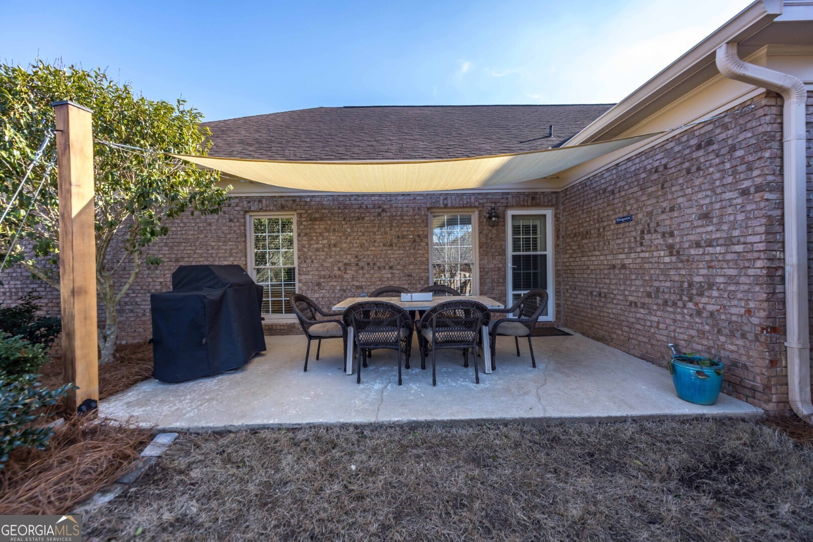 6742 Bridge Way Columbus, GA 31904 - Photo 43 of 45 a view of a chairs and table in the backyard