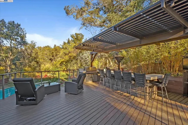 a view of a chairs and table on the wooden floor