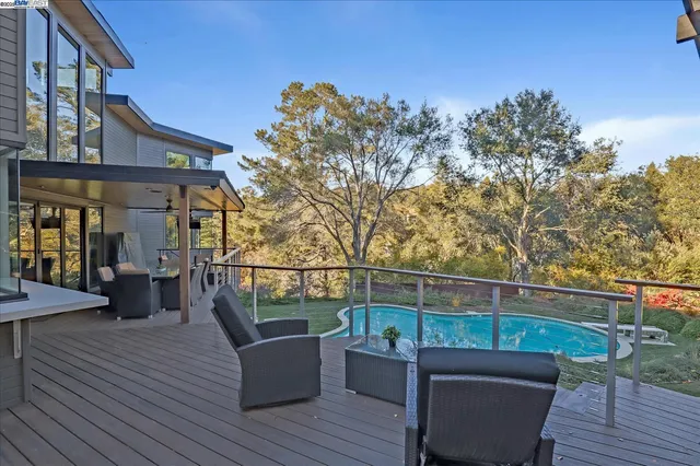 a view of a roof deck with couches