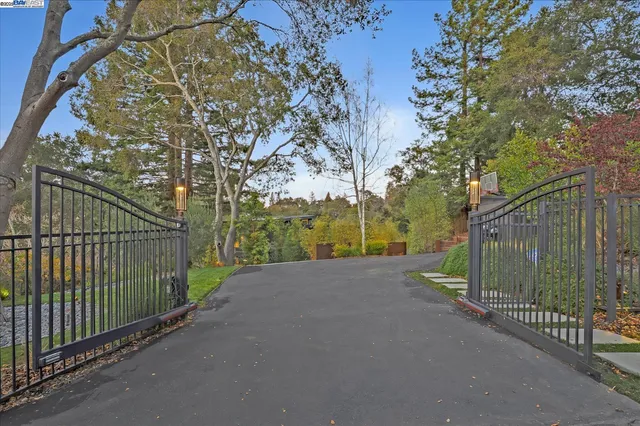 a view of a pathway both side of house
