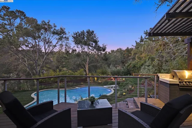 a view of a chairs and table on the wooden floor