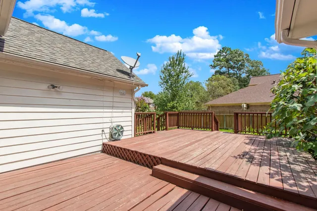 a view of backyard with a patio