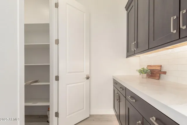 a view of an empty walk in closet