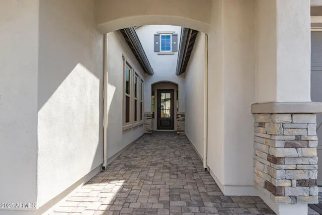 a view of a hallway with front door