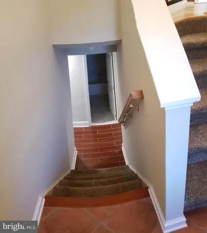 a view of a livingroom with wooden floor