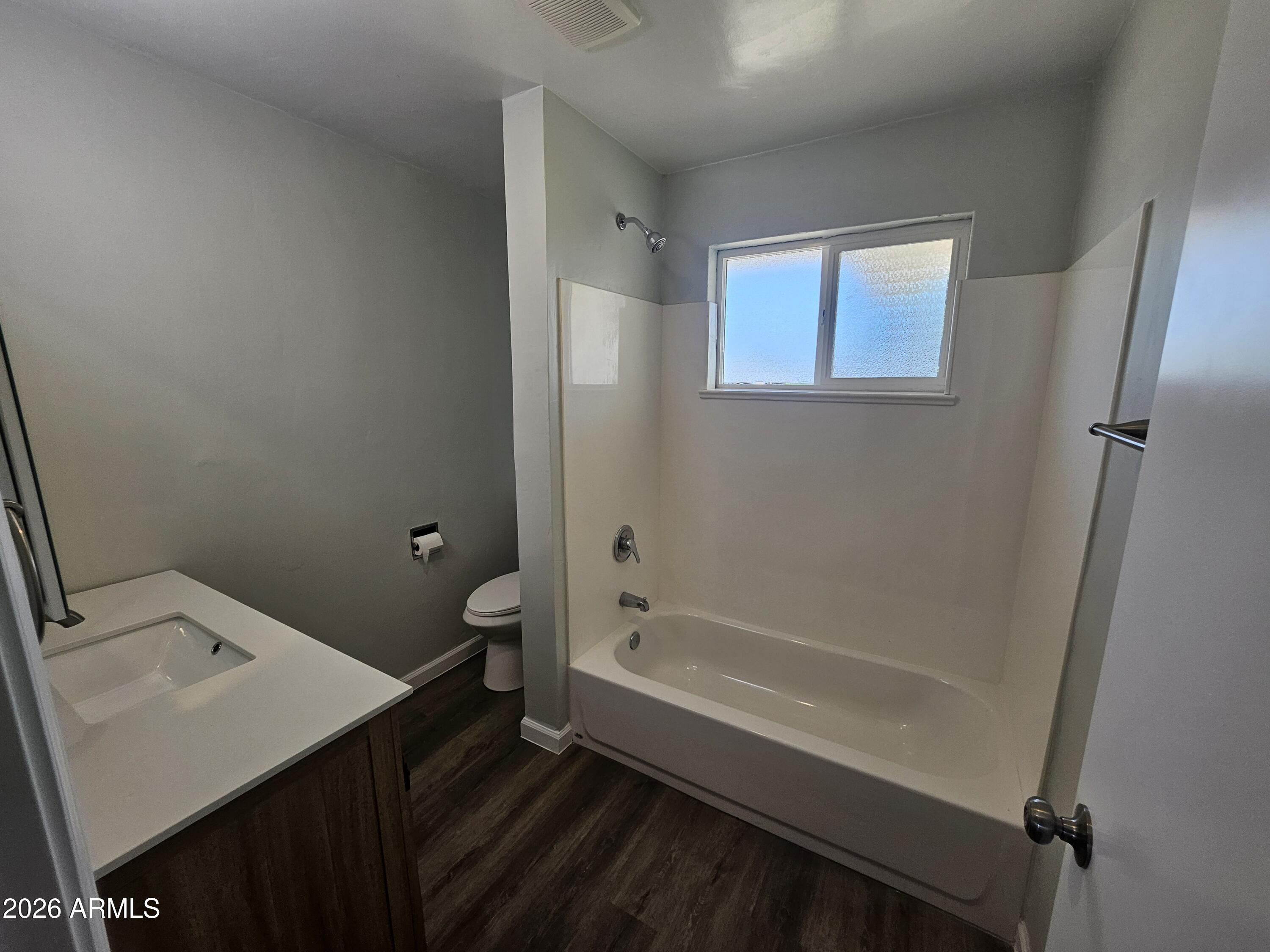 524 West 3rd Place Mesa, AZ 85201 - Photo 15 of 23 a bathroom with a sink a toilet and shower
