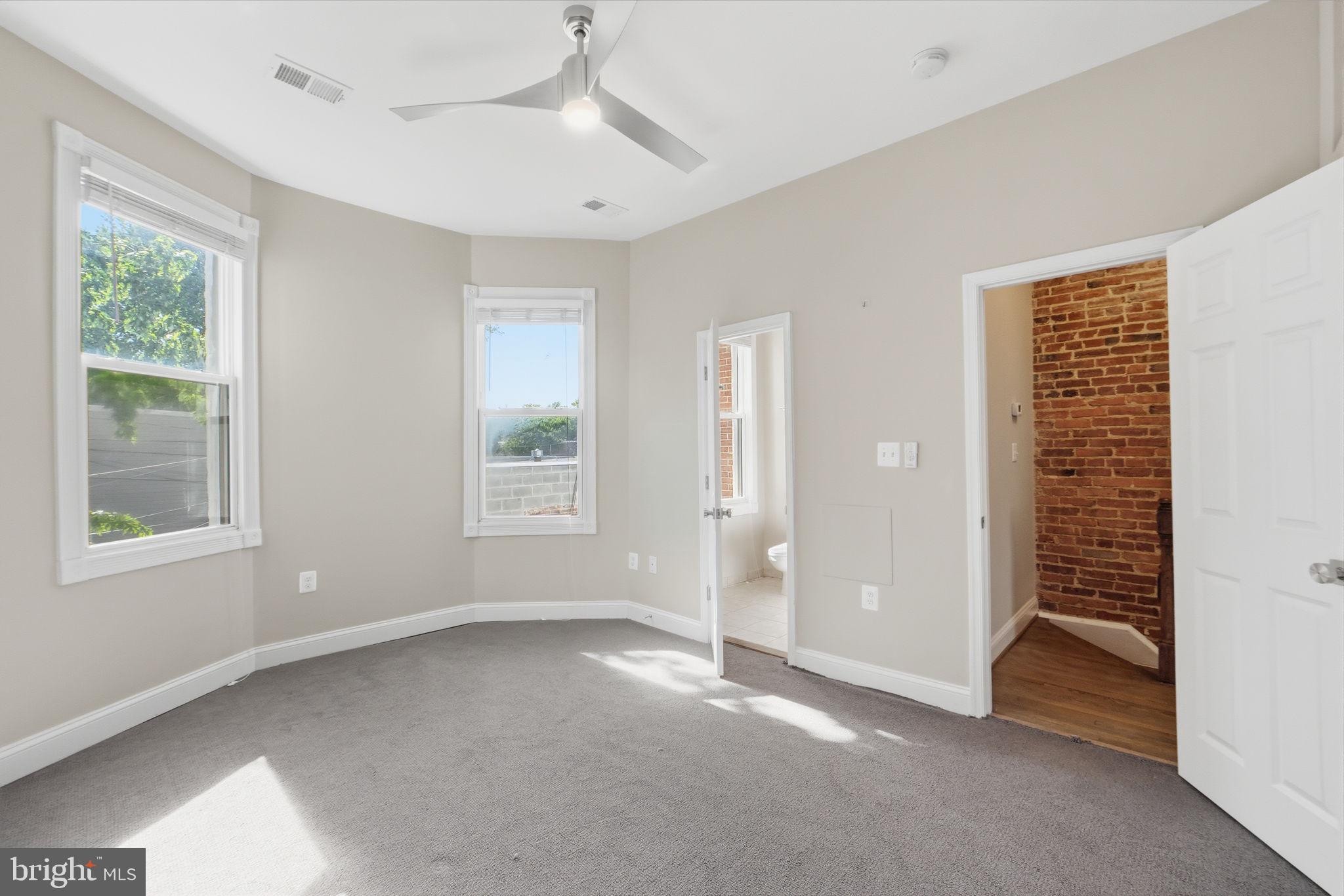 706 12th Street Northeast Washington, DC 20002 - Photo 17 of 49 a view of an empty room with a window
