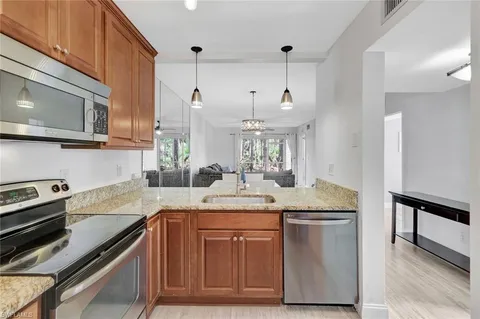$250,000 | 1965 Courtyard Way, Unit E106, Naples, FL 34112