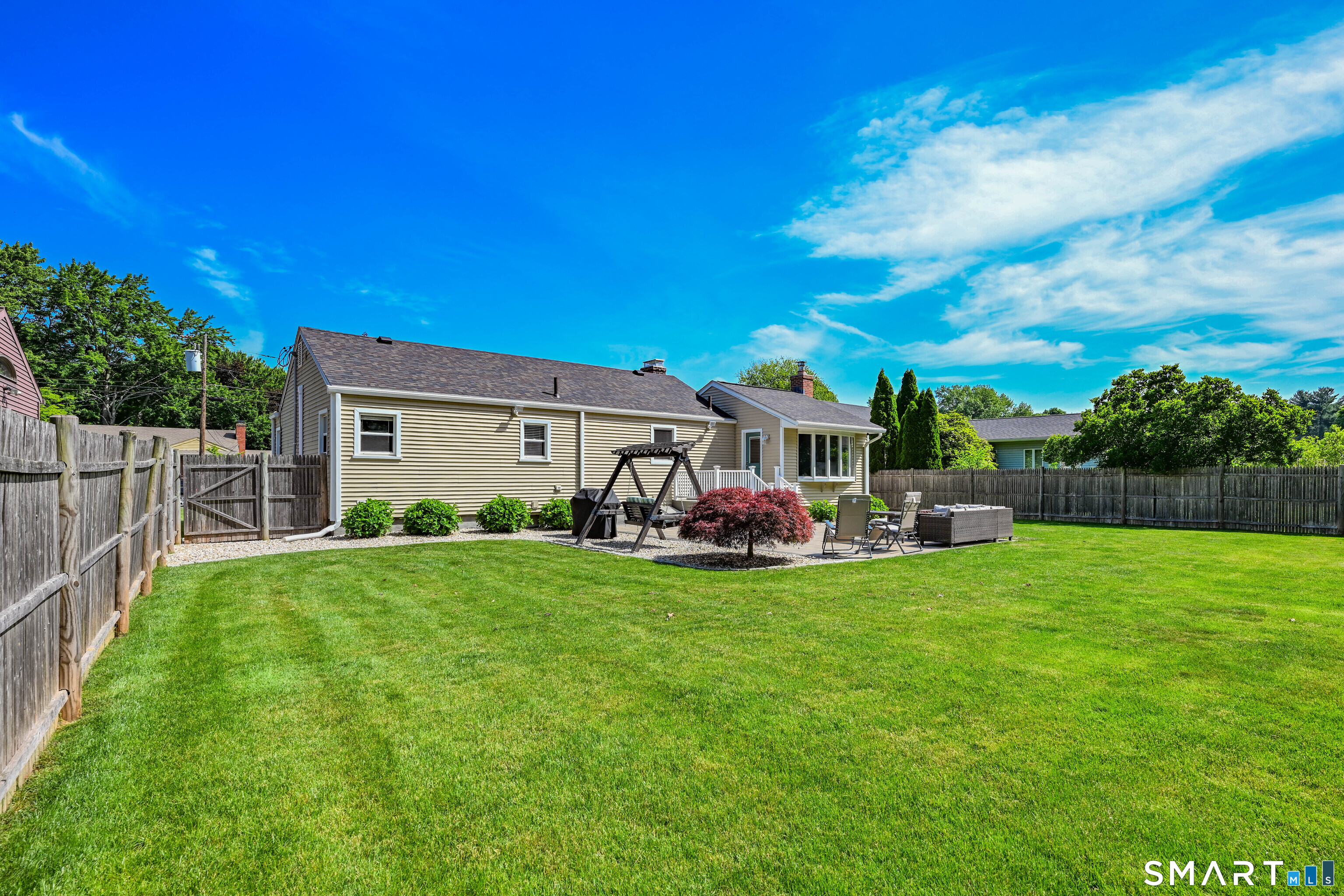 87 Lydall Road Newington, CT 06111 - Photo 29 of 35 a view of a house with backyard porch and garden