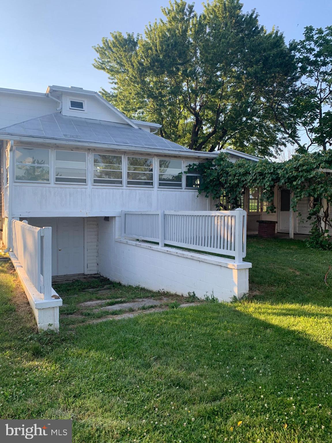248 Readus Road Edinburg, VA 22824 - Photo 5 of 23 a view of a house with a yard and a fence