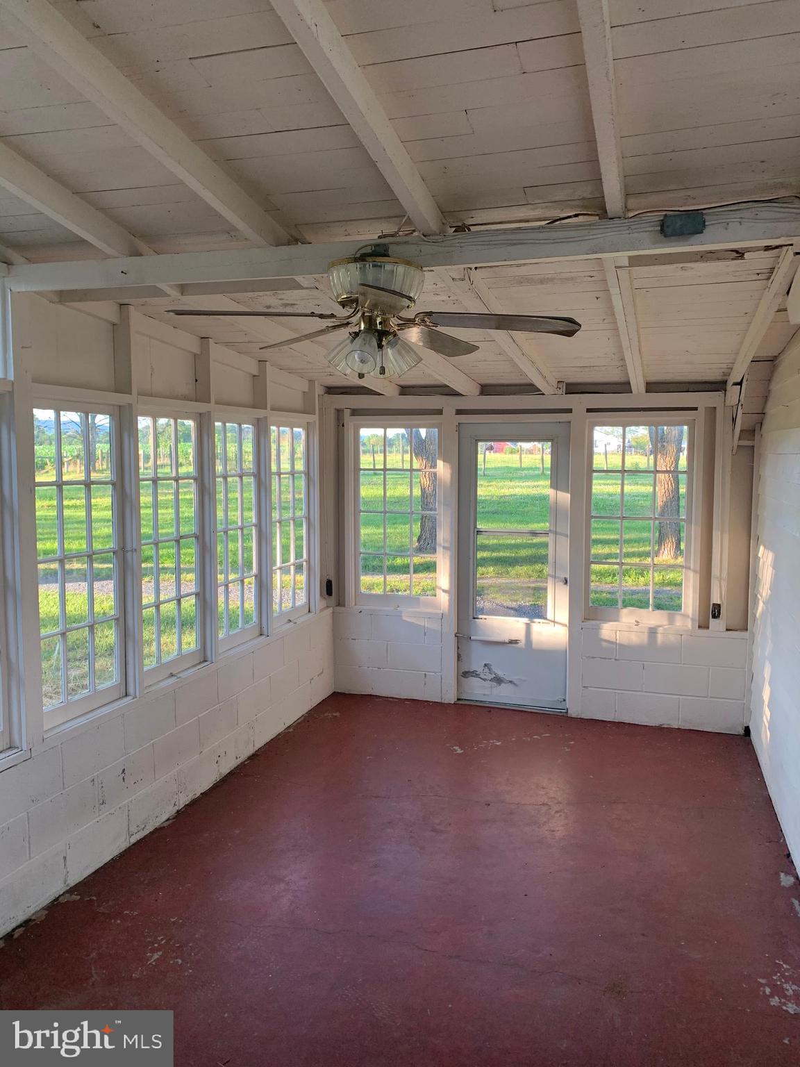 248 Readus Road Edinburg, VA 22824 - Photo 9 of 23 a view of room with window and hardwood floor