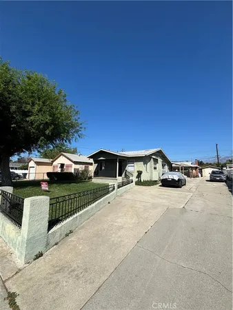 a view of a street with cars on road