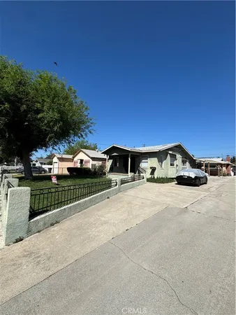 a view of a car parked on the side of the road