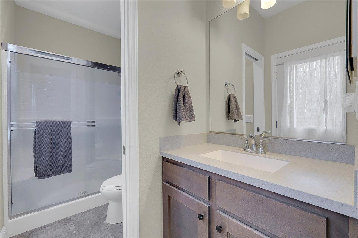 4667 Fruitland Road Marysville, CA 95901 - Photo 12 of 42 a bathroom with a sink toilet and shower