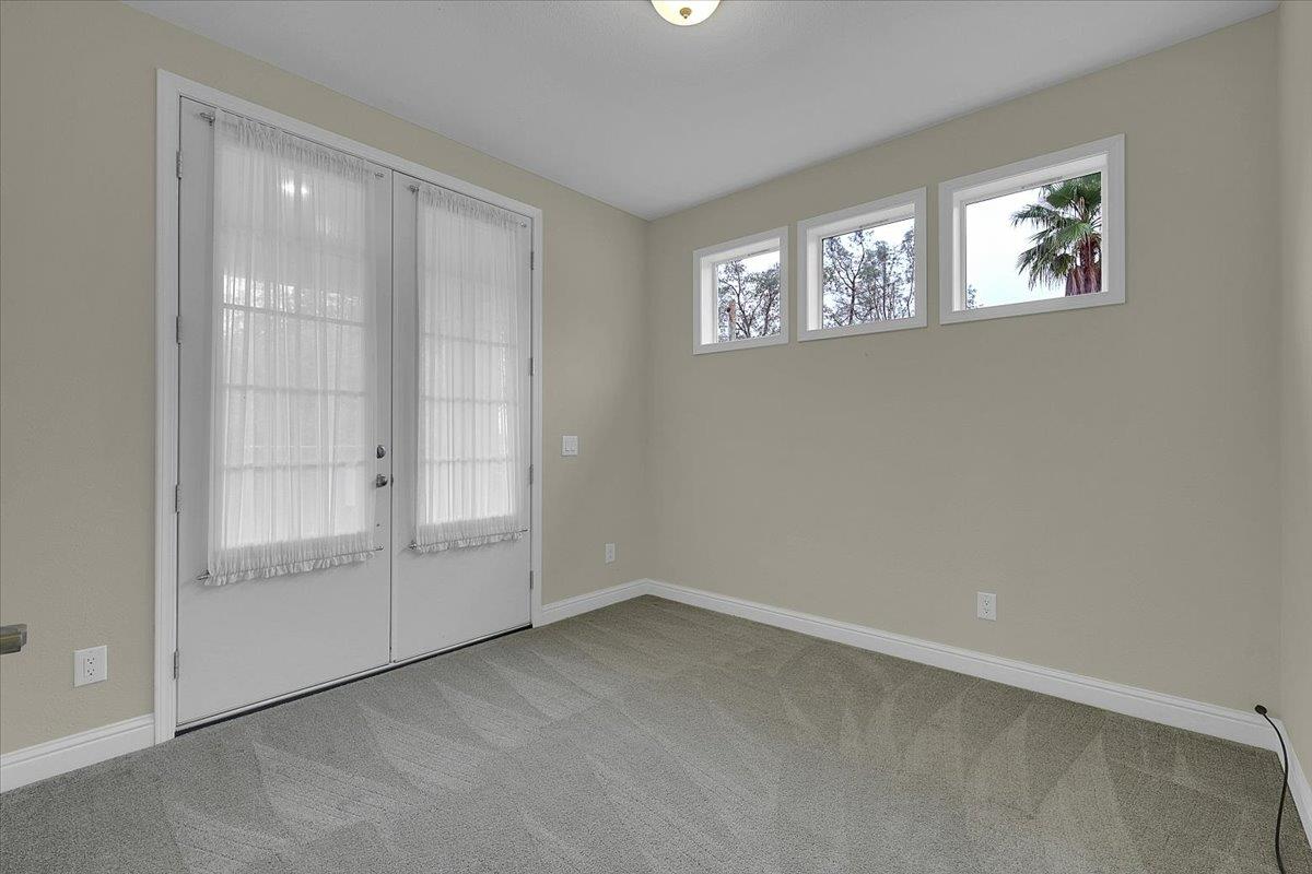 4667 Fruitland Road Marysville, CA 95901 - Photo 13 of 42 an empty room with windows and closet