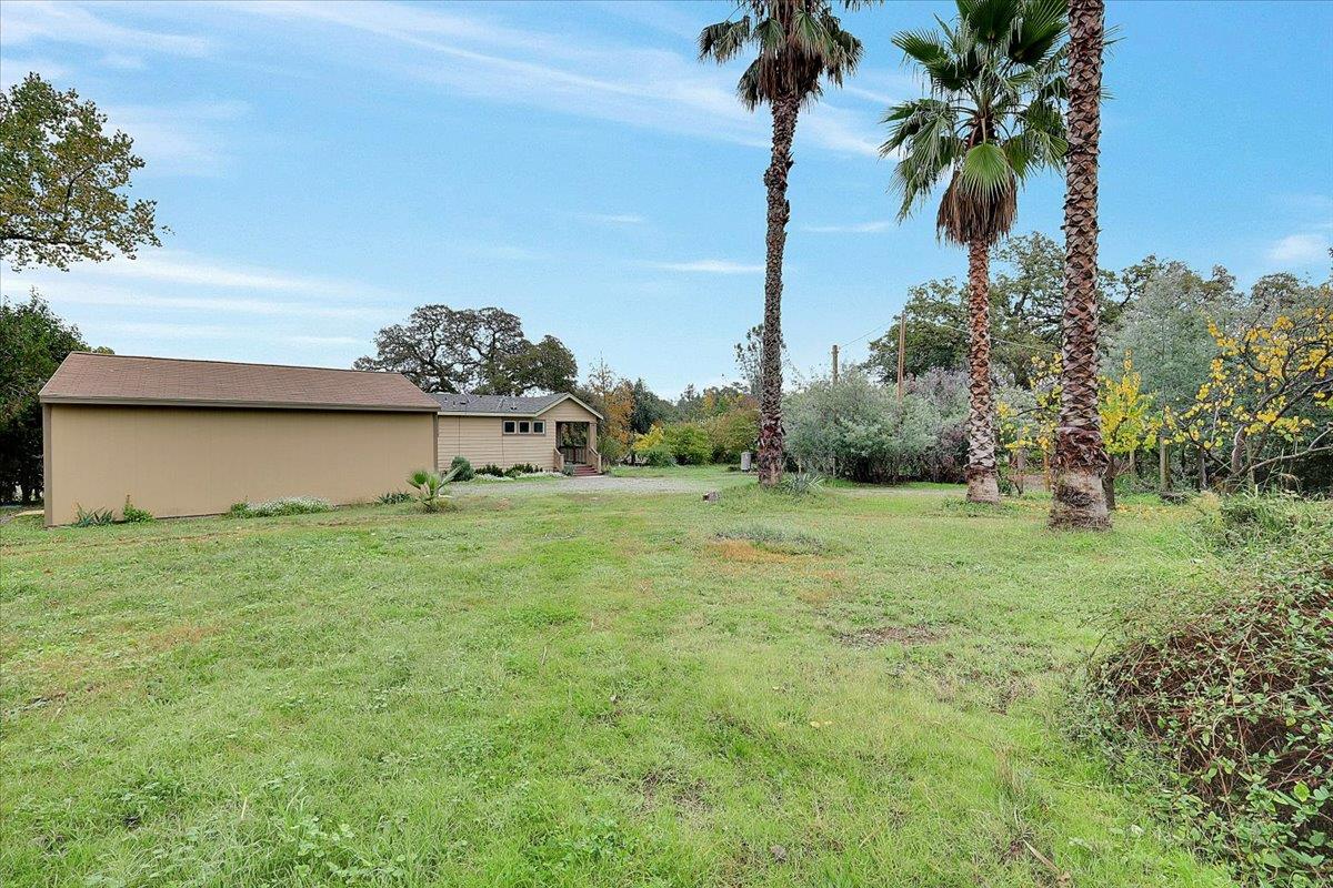 4667 Fruitland Road Marysville, CA 95901 - Photo 22 of 42 a house view with a garden space