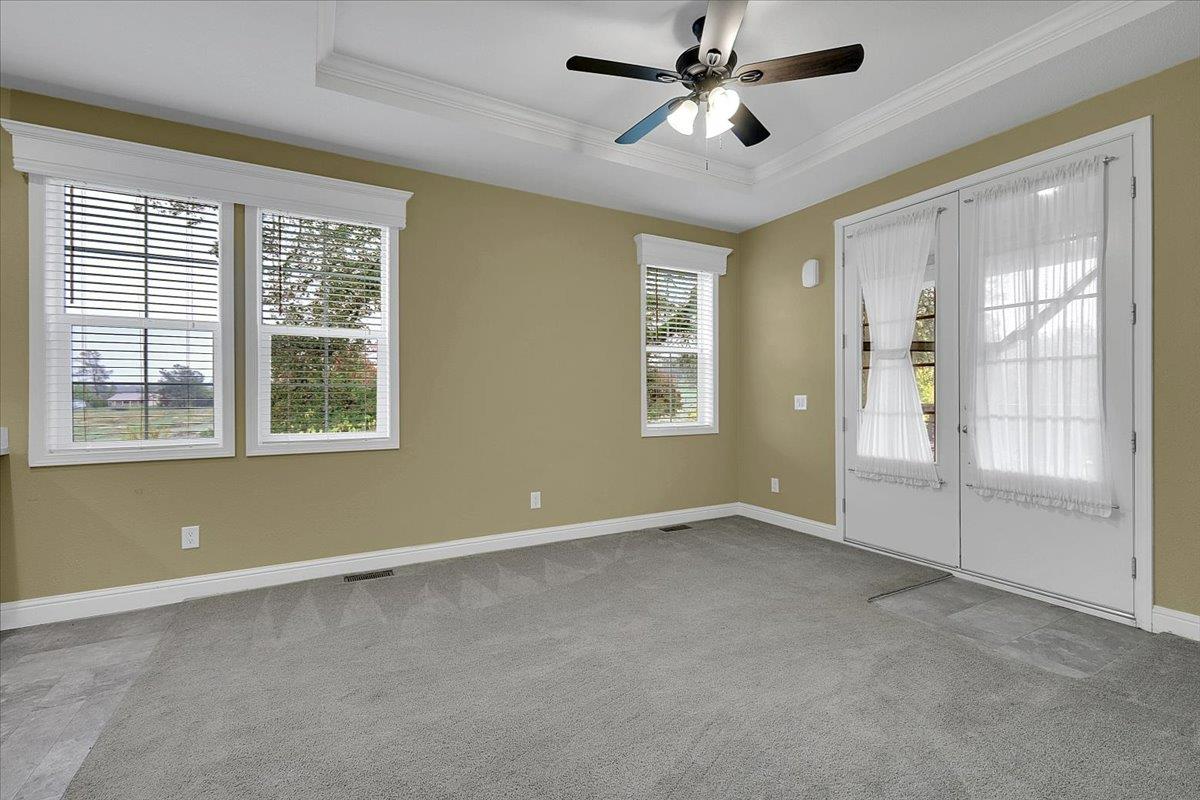 4667 Fruitland Road Marysville, CA 95901 - Photo 3 of 42 a view of an empty room with a window and a kitchen