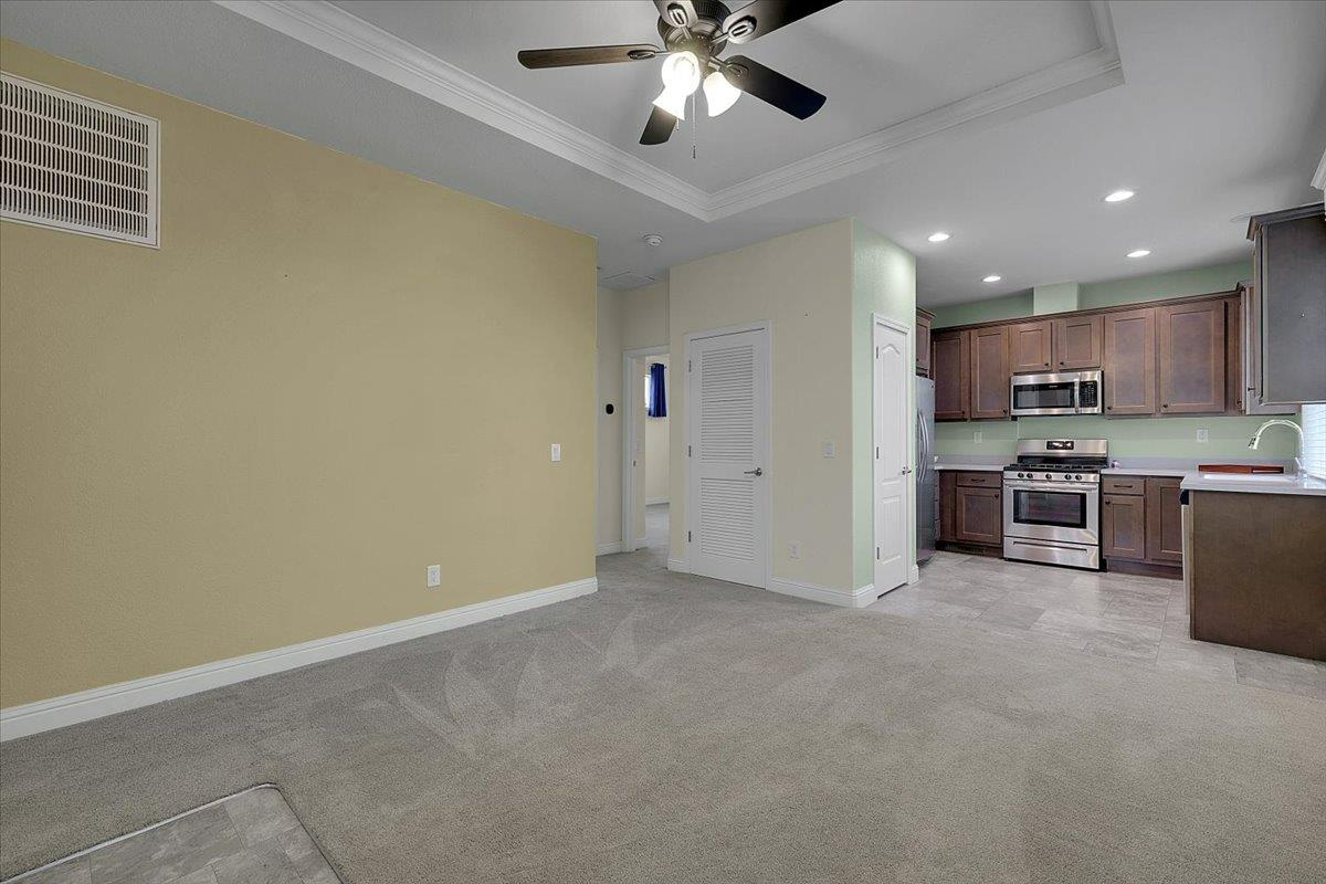 4667 Fruitland Road Marysville, CA 95901 - Photo 6 of 42 a view of a kitchen with a sink and dishwasher