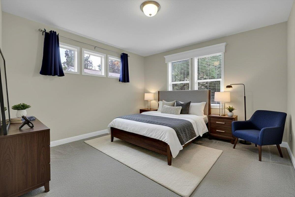 4667 Fruitland Road Marysville, CA 95901 - Photo 10 of 42 a bedroom with a bed and a couch