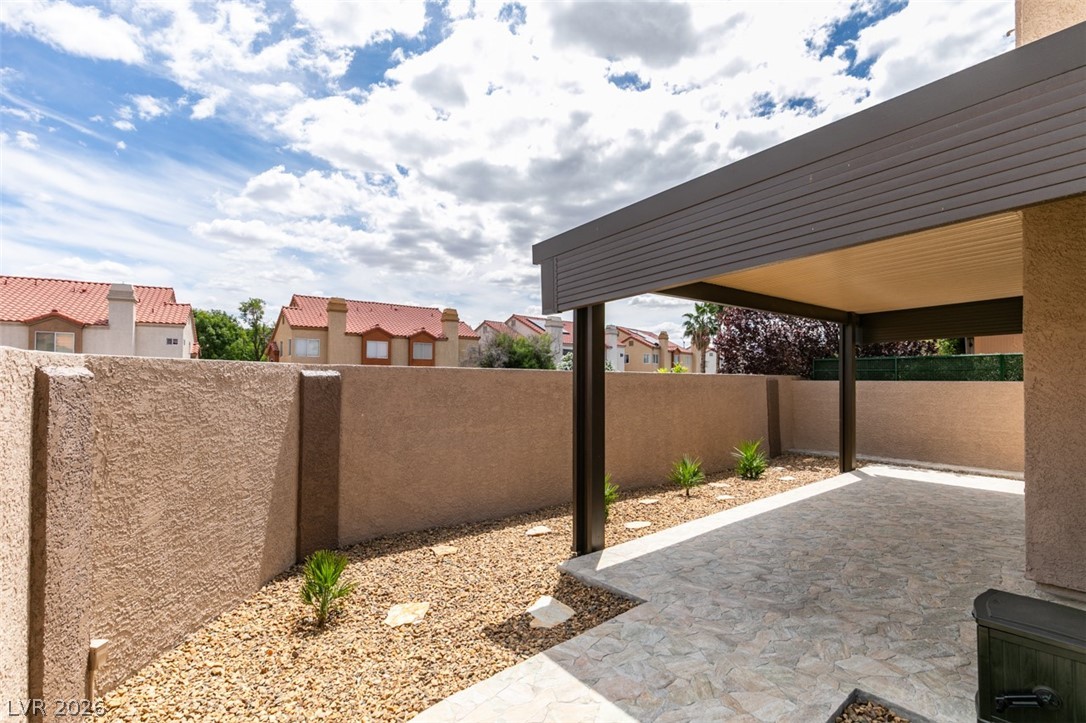 540 Sutters Mill Road Henderson, NV 89014 - Photo 44 of 46 Enjoy outdoor living with a covered patio and low-maintenance landscaping.