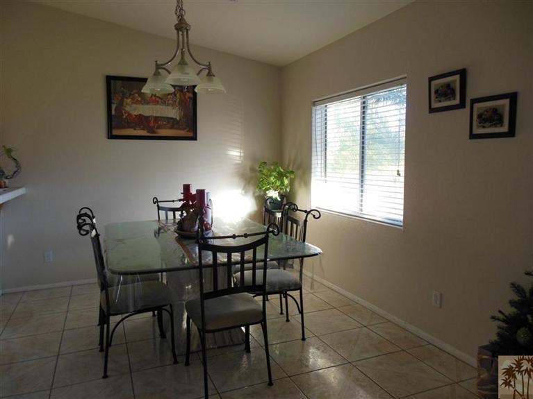 66033 Santa Rosa Road Desert Hot Springs, CA 92240 - Photo 4 of 21 a view of a dining room with furniture and window