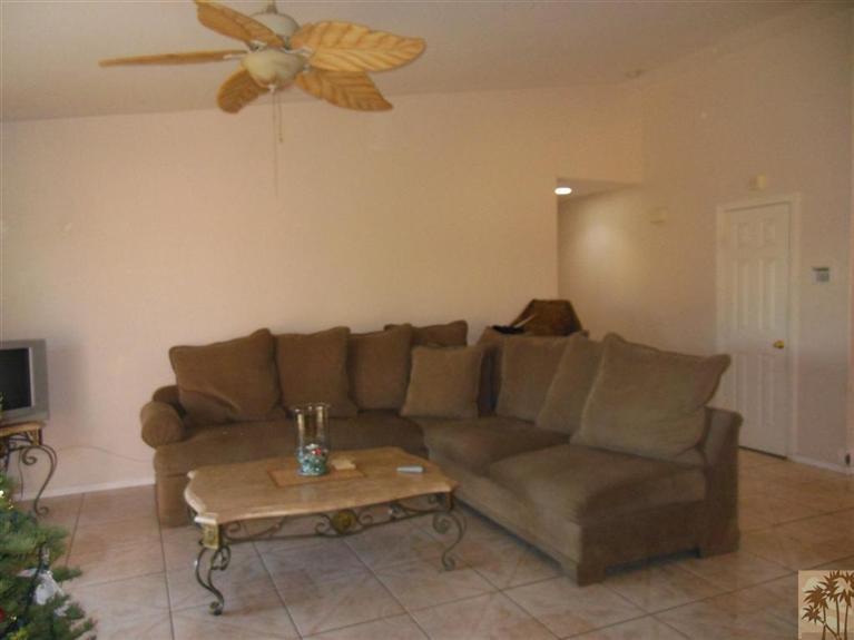 66033 Santa Rosa Road Desert Hot Springs, CA 92240 - Photo 9 of 21 a living room with furniture