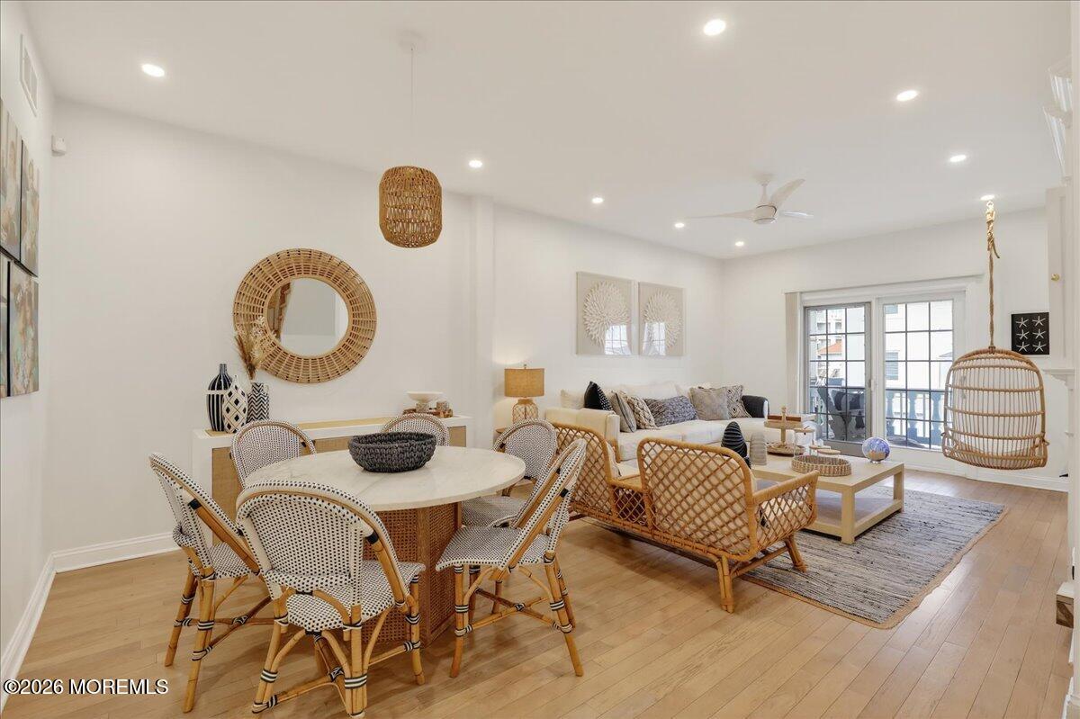 21 Riviera Drive Long Branch, NJ 07740 - Photo 11 of 64 a living room with furniture and a window