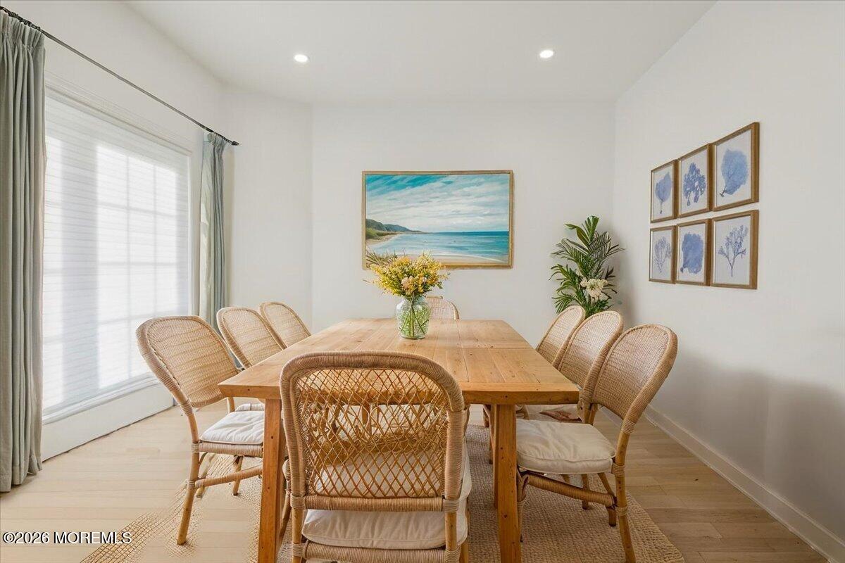 21 Riviera Drive Long Branch, NJ 07740 - Photo 23 of 64 a view of a dining room with furniture window and wooden floor