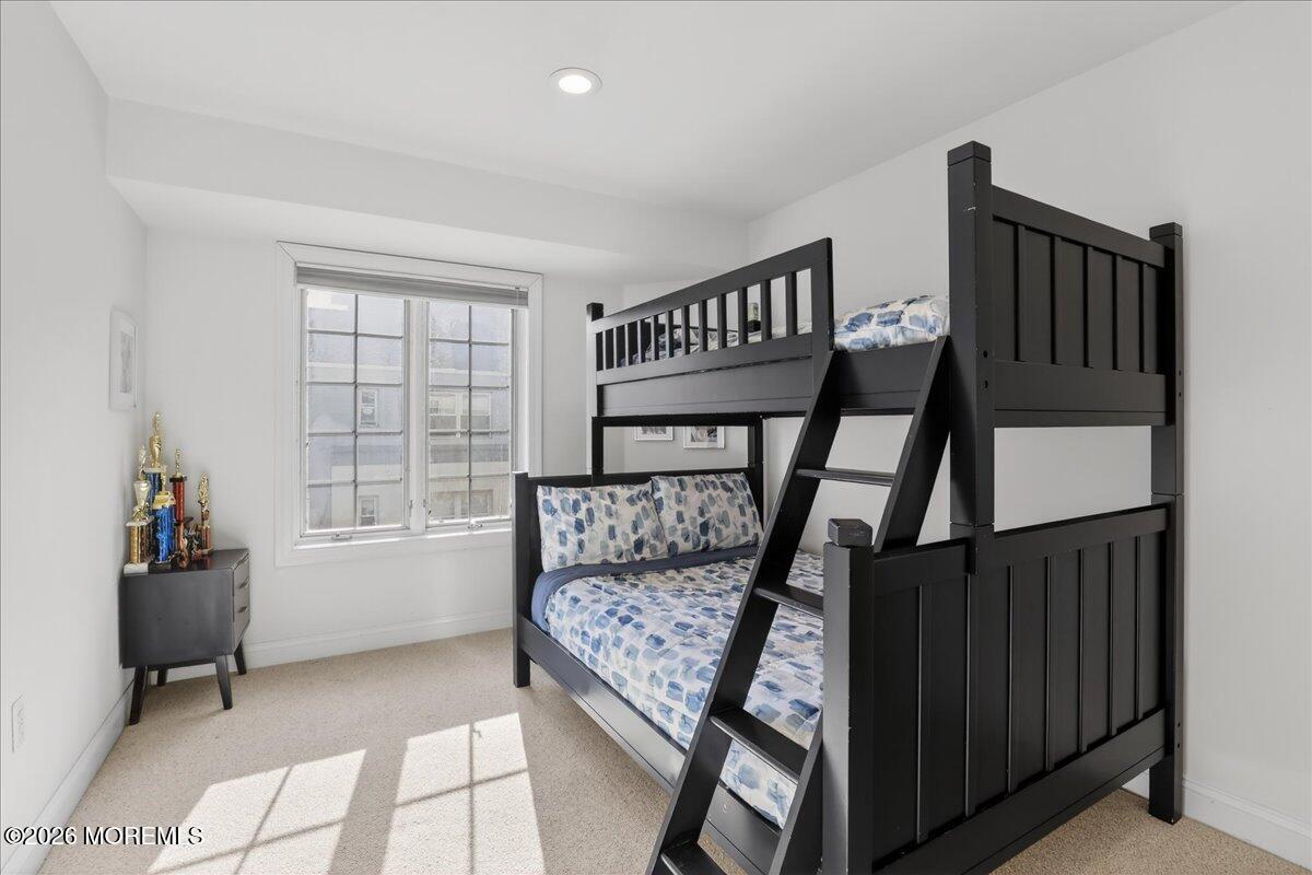 21 Riviera Drive Long Branch, NJ 07740 - Photo 26 of 64 a view of staircase with white walls and windows