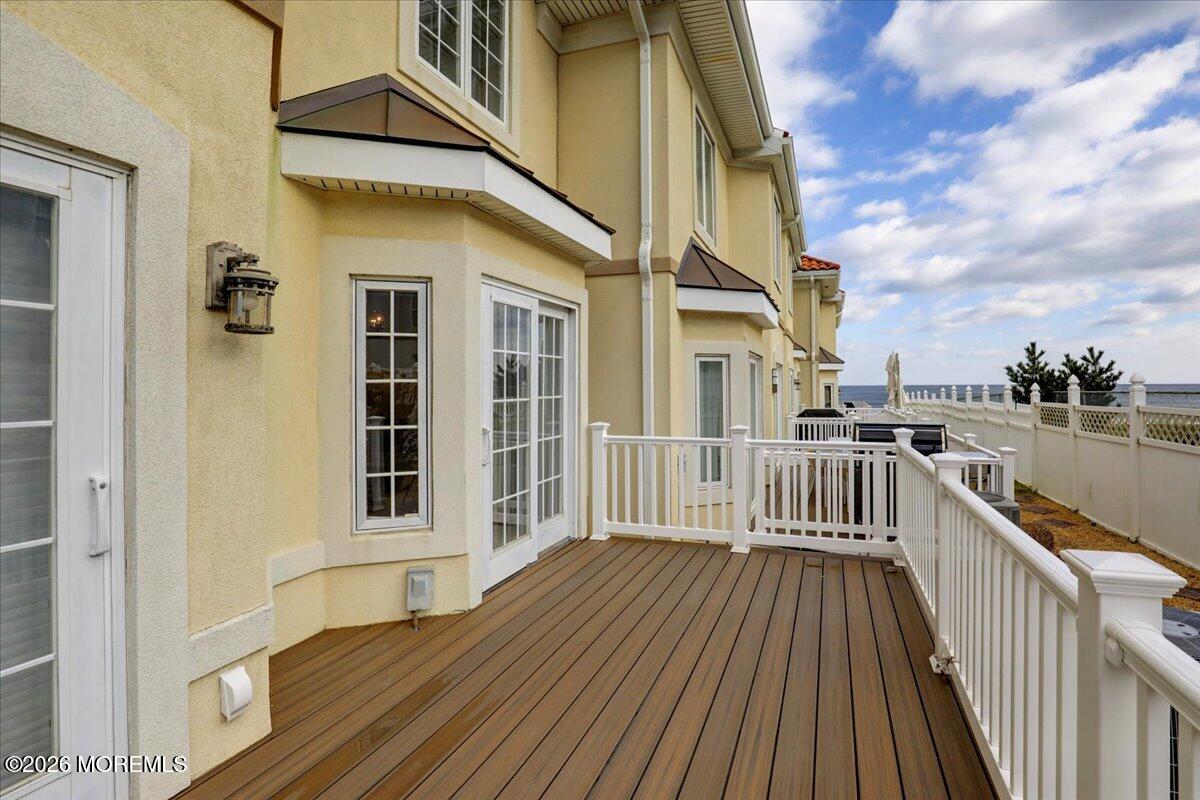 21 Riviera Drive Long Branch, NJ 07740 - Photo 31 of 64 a view of a house with wooden deck