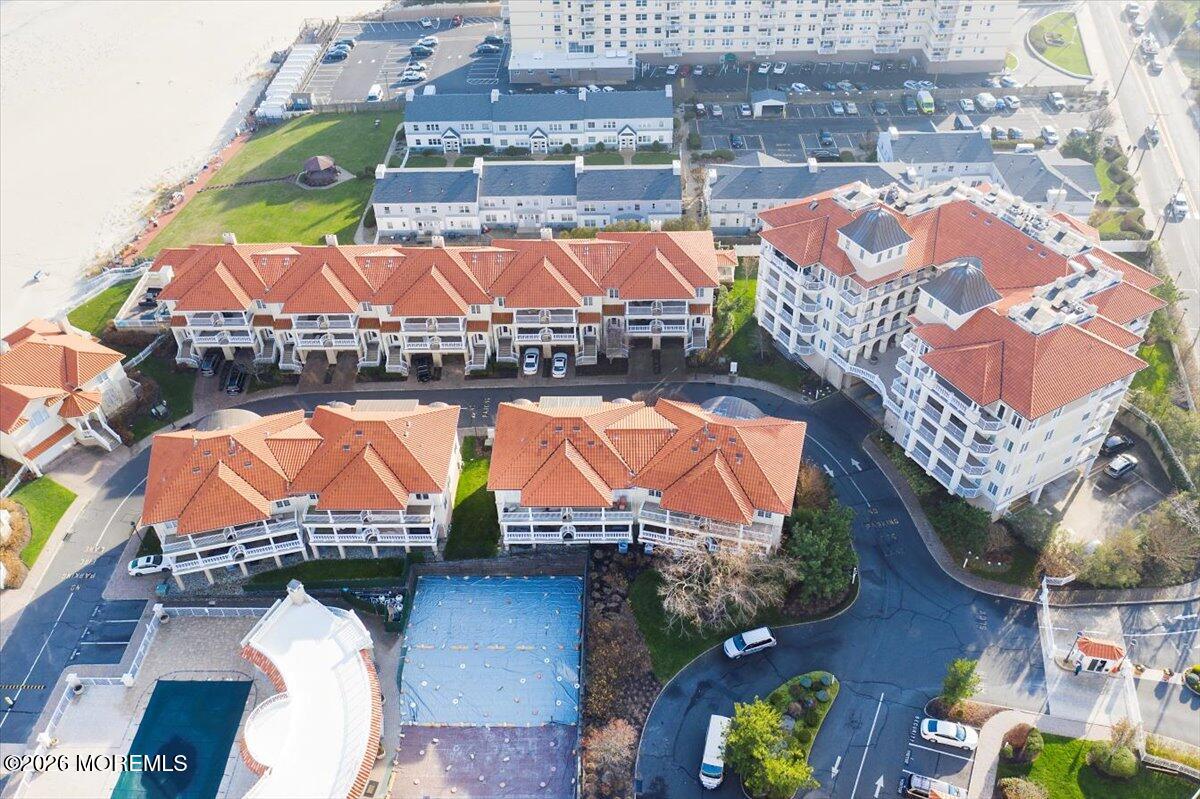 21 Riviera Drive Long Branch, NJ 07740 - Photo 50 of 64 a view of swimming pool with a lounge chairs
