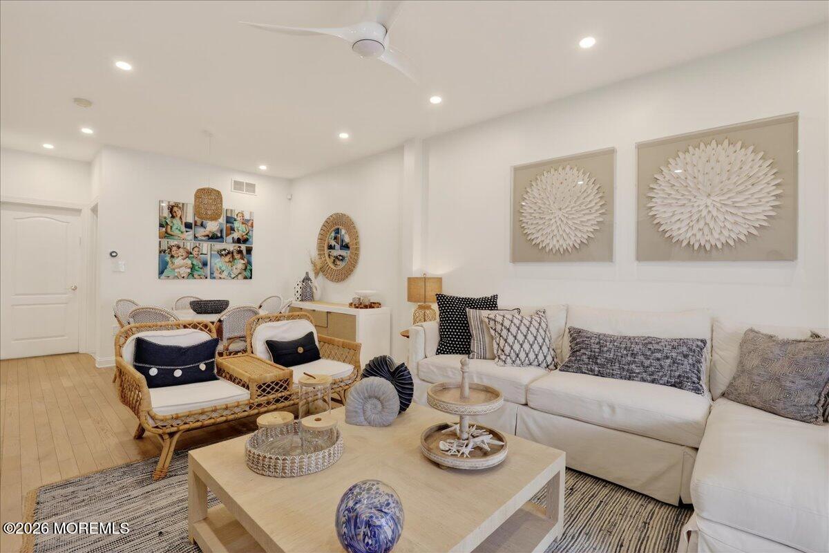 21 Riviera Drive Long Branch, NJ 07740 - Photo 5 of 64 a living room with furniture and wooden floor