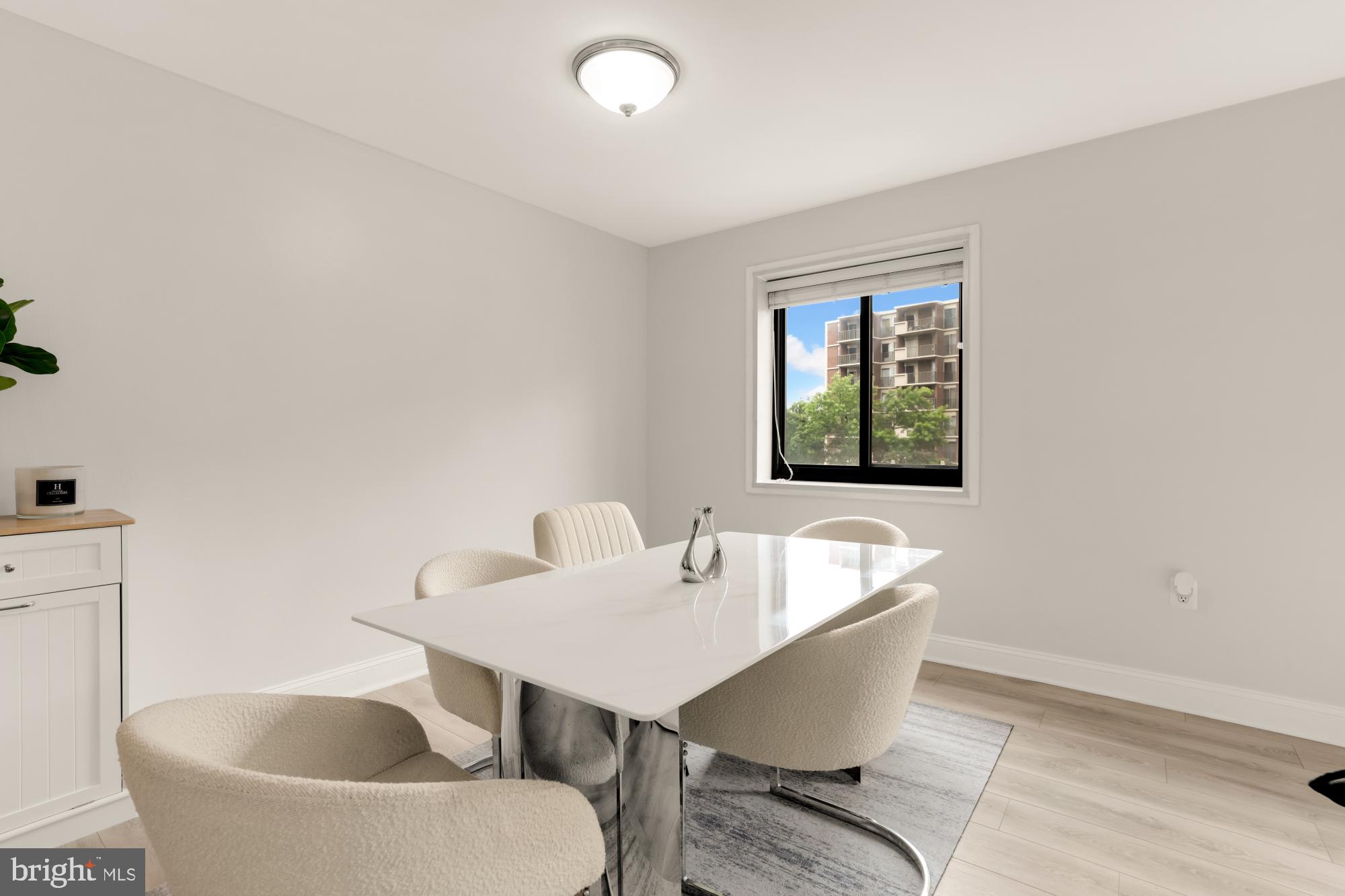 1200 South Arlington Ridge Road, Unit 507 Arlington, VA 22202 - Photo 13 of 30 a dining room with furniture and window