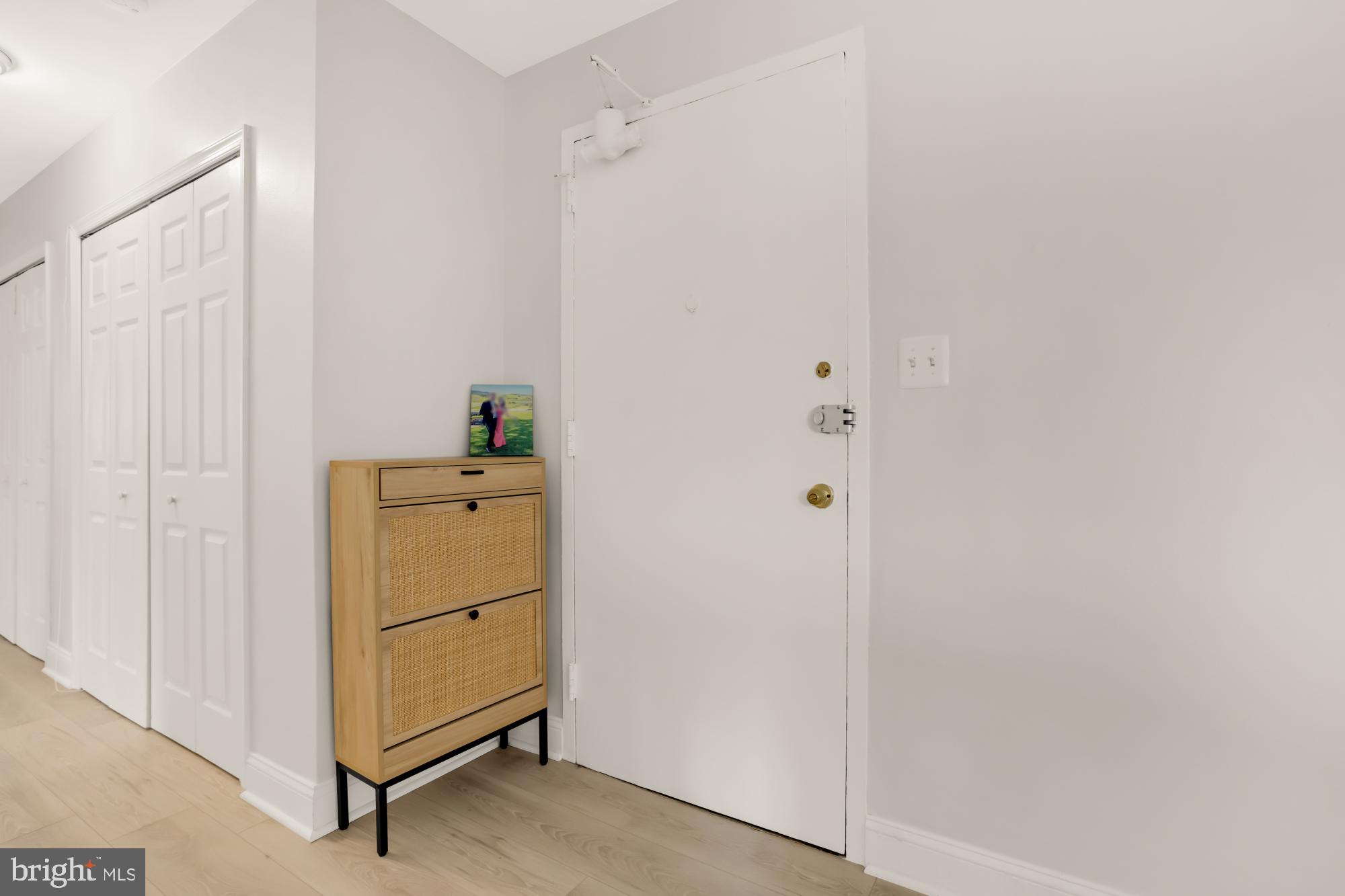 1200 South Arlington Ridge Road, Unit 507 Arlington, VA 22202 - Photo 25 of 30 a room that has a dresser in it